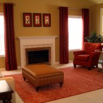 after grt rm left Paint, window treatments, art and an area rug transform this space.